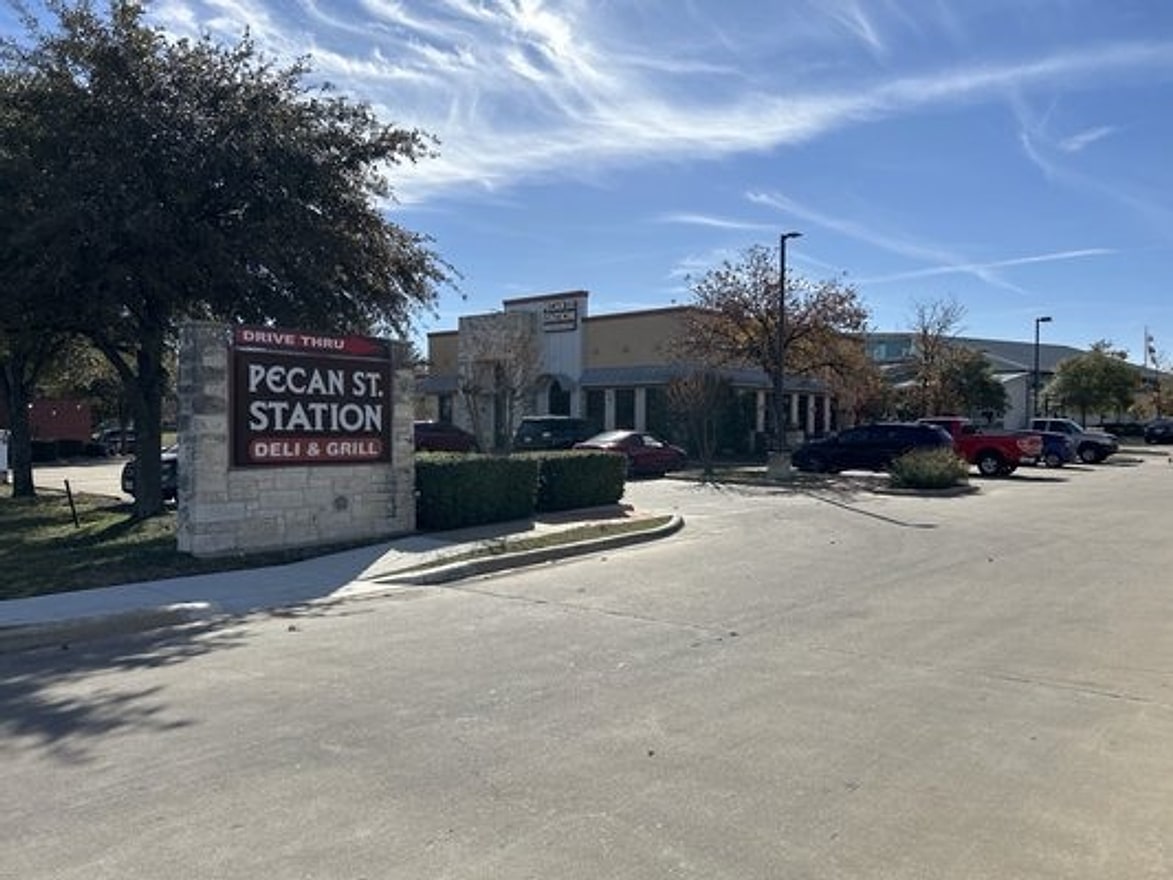Pecan St. Station drive-thru monument sign