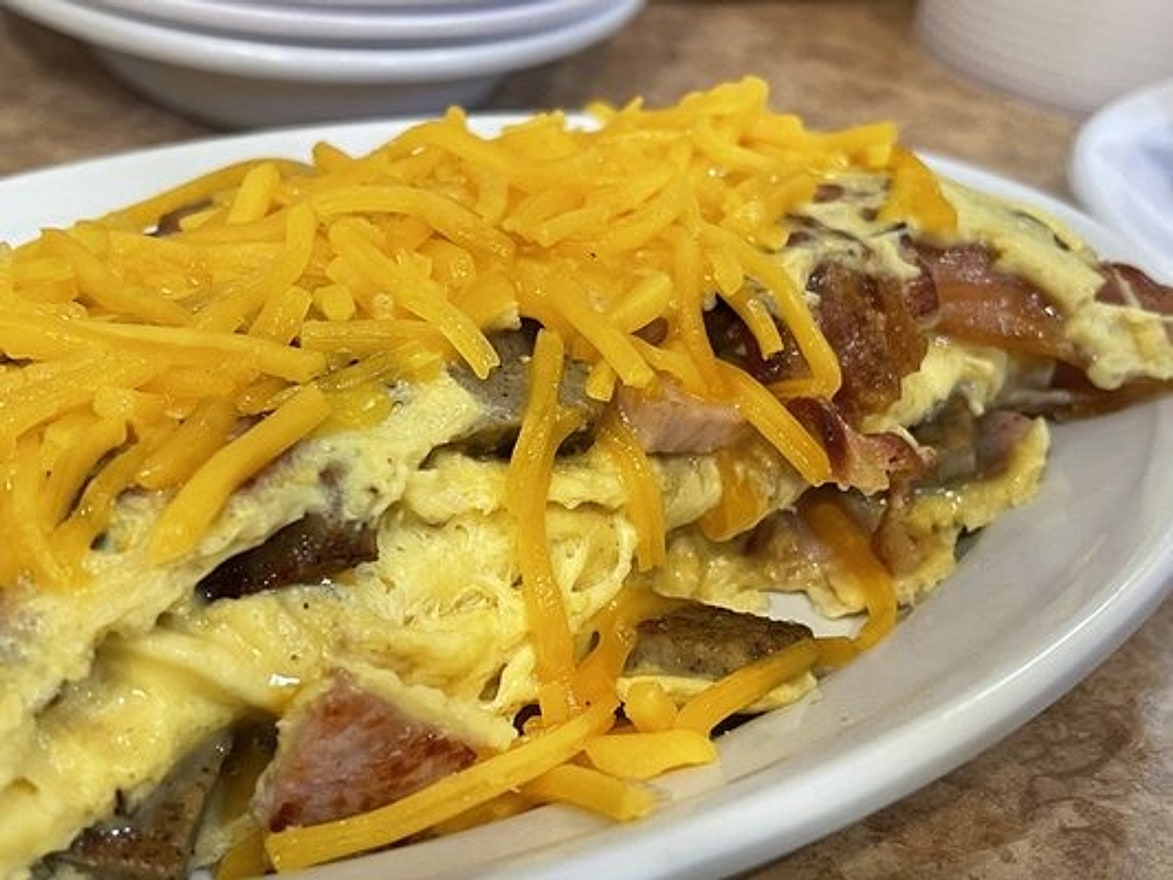 Bacon and sausage omelet with cheddar at Pecan St. Station