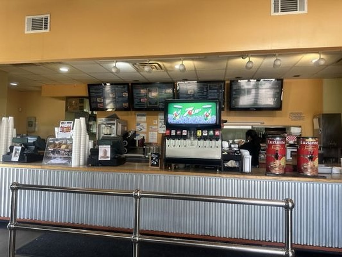 Service counter and soda fountain at Pecan St. Station